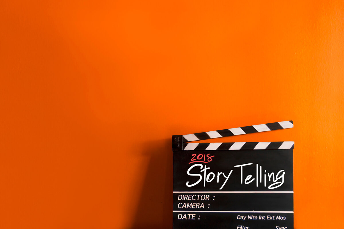 Bright orange background, Story telling on black rectangle