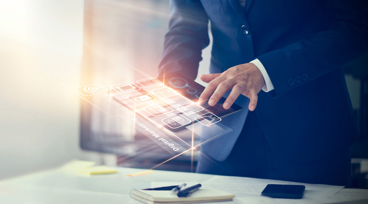 man in business suit using mobile device